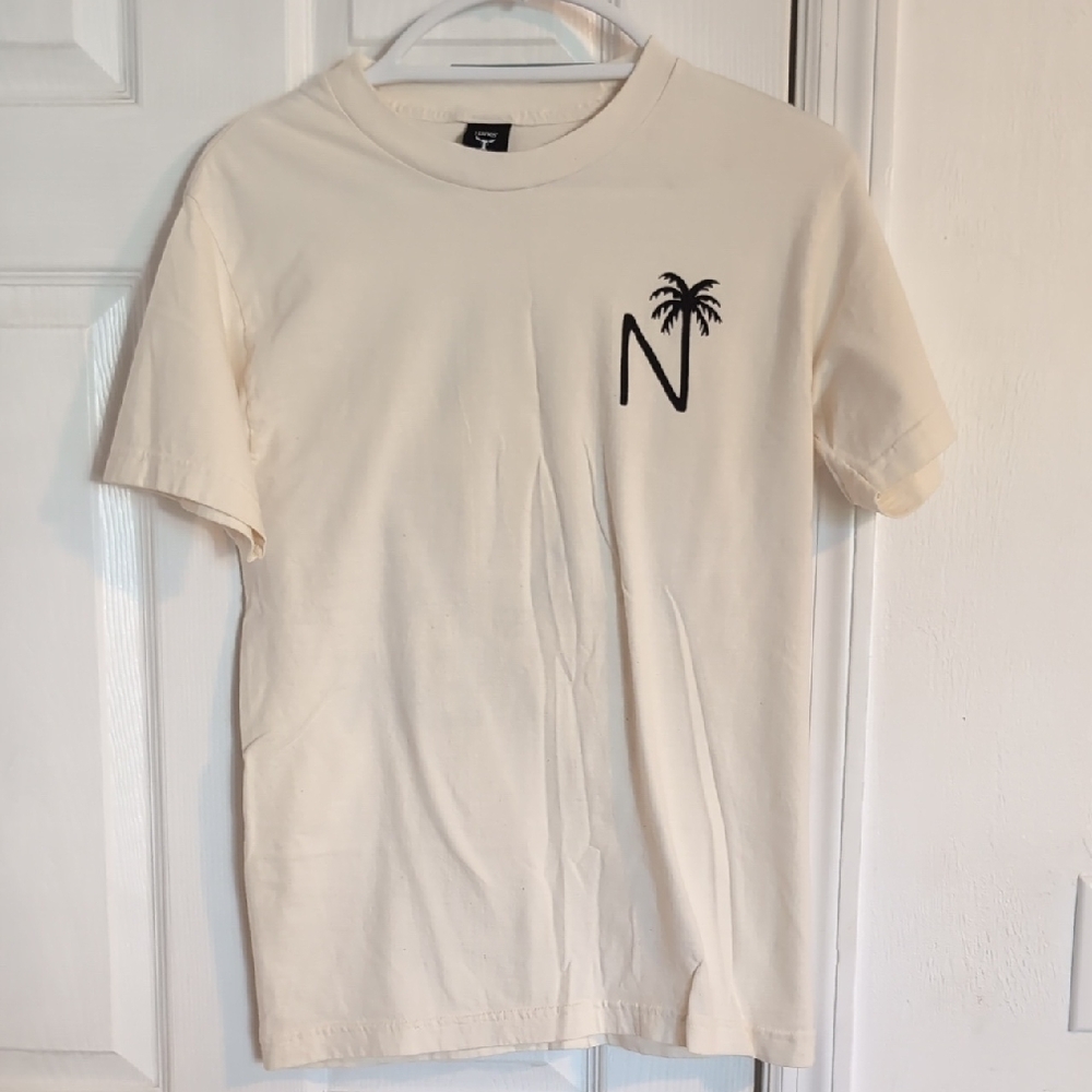 Cream Tee with Palm Tree and N Logo Needs An Ocean